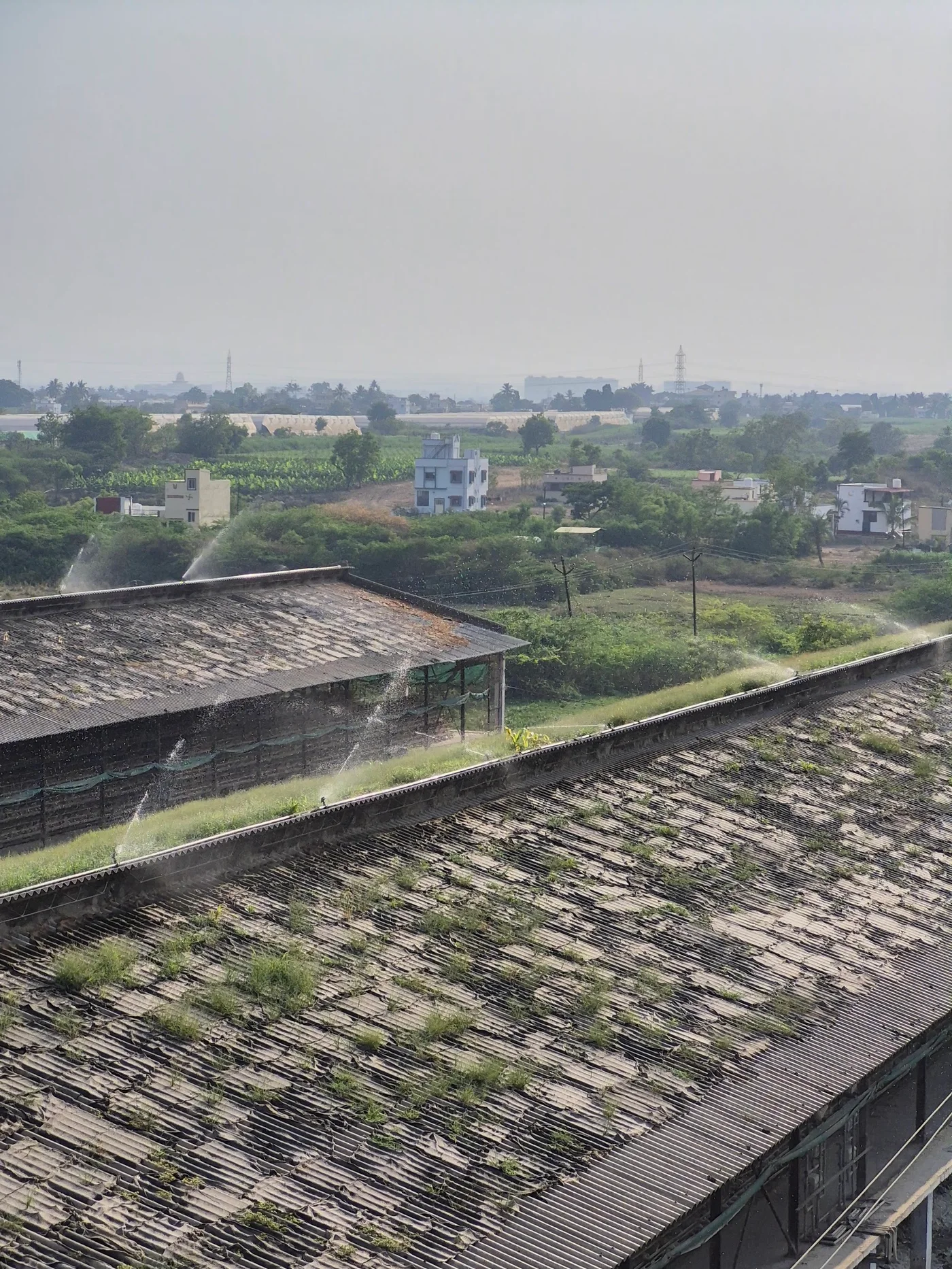 Roofline view looking toward the nearby village and fields