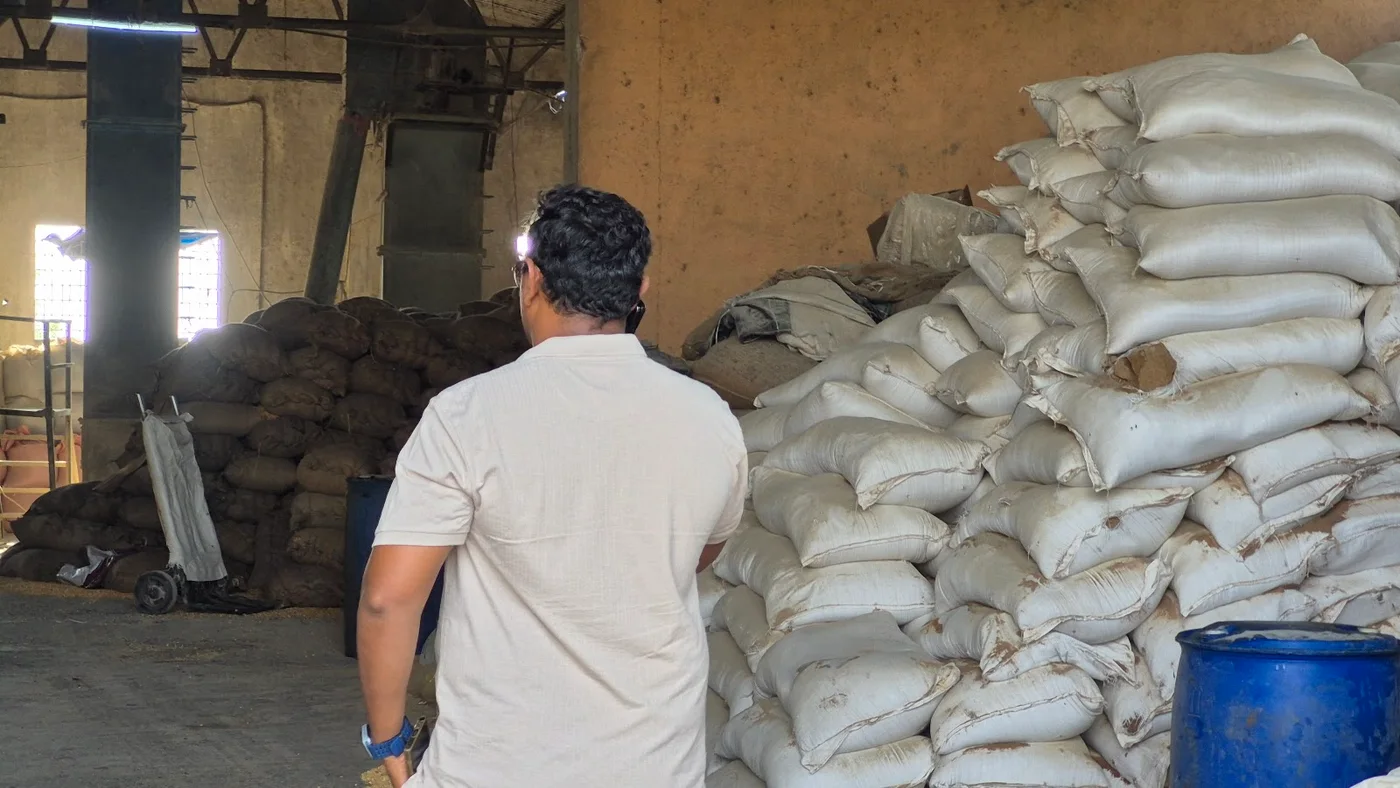 Warehouse corner with machinery and stored sacks